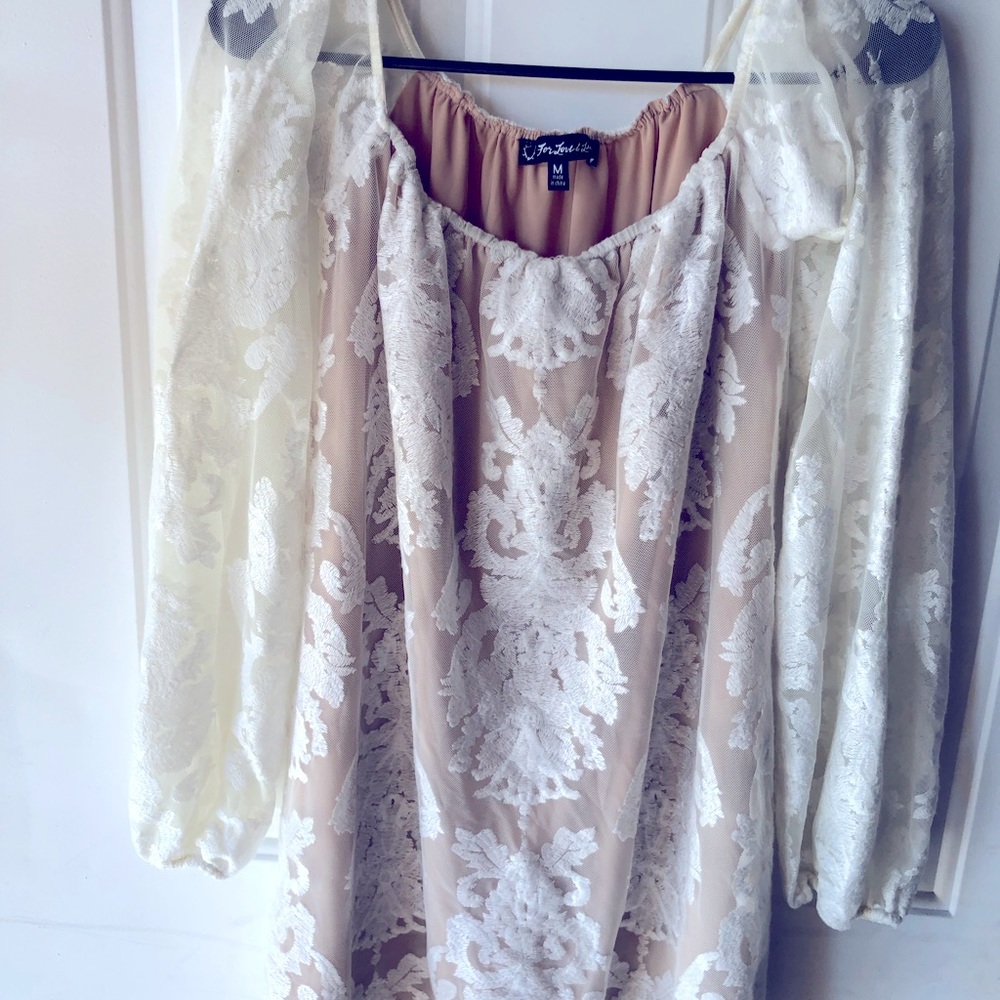 Long sleeves, off the shoulder dress.  Neutral color perfect for all occasions.